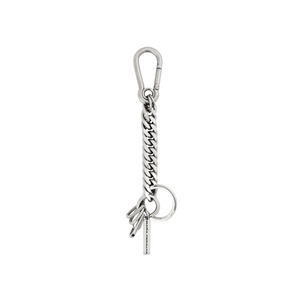 Silver keychain with chain and small charms on a white background