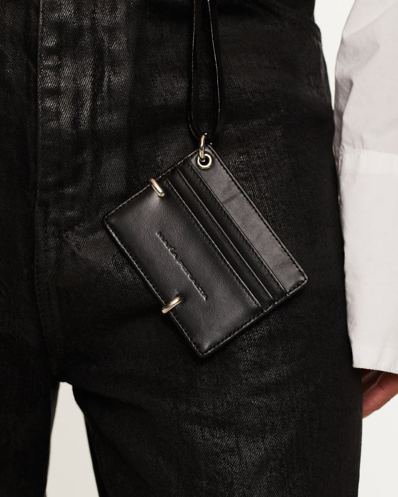 Black wallet with strap on a white background